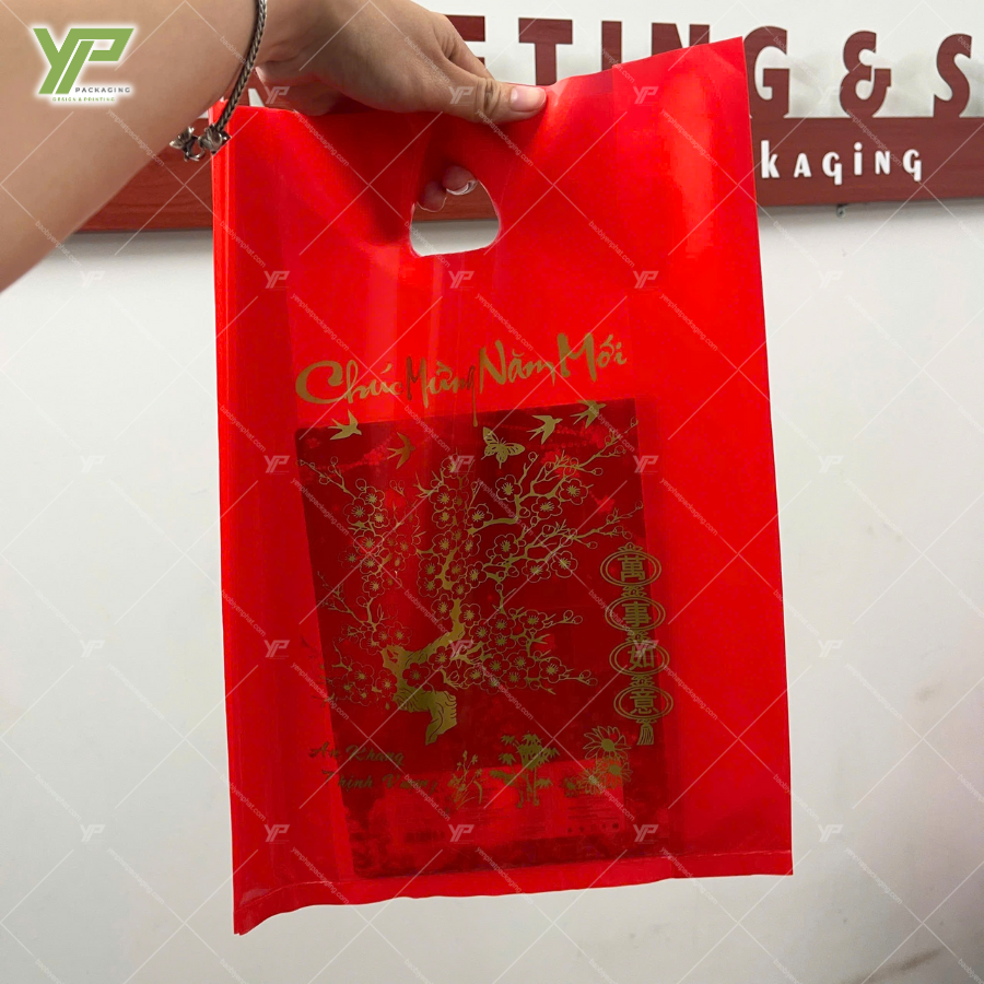 tui-xoai-mau-do-in-chu-vang-phu-hop-khong-khi-tet