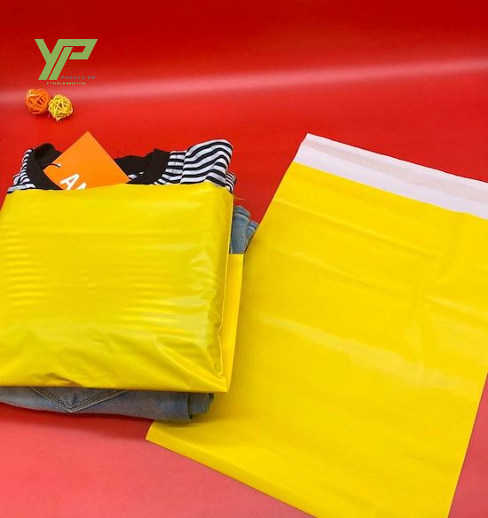 Túi niêm phong 2 da màu vàng, đựng quần áo shop thời trang